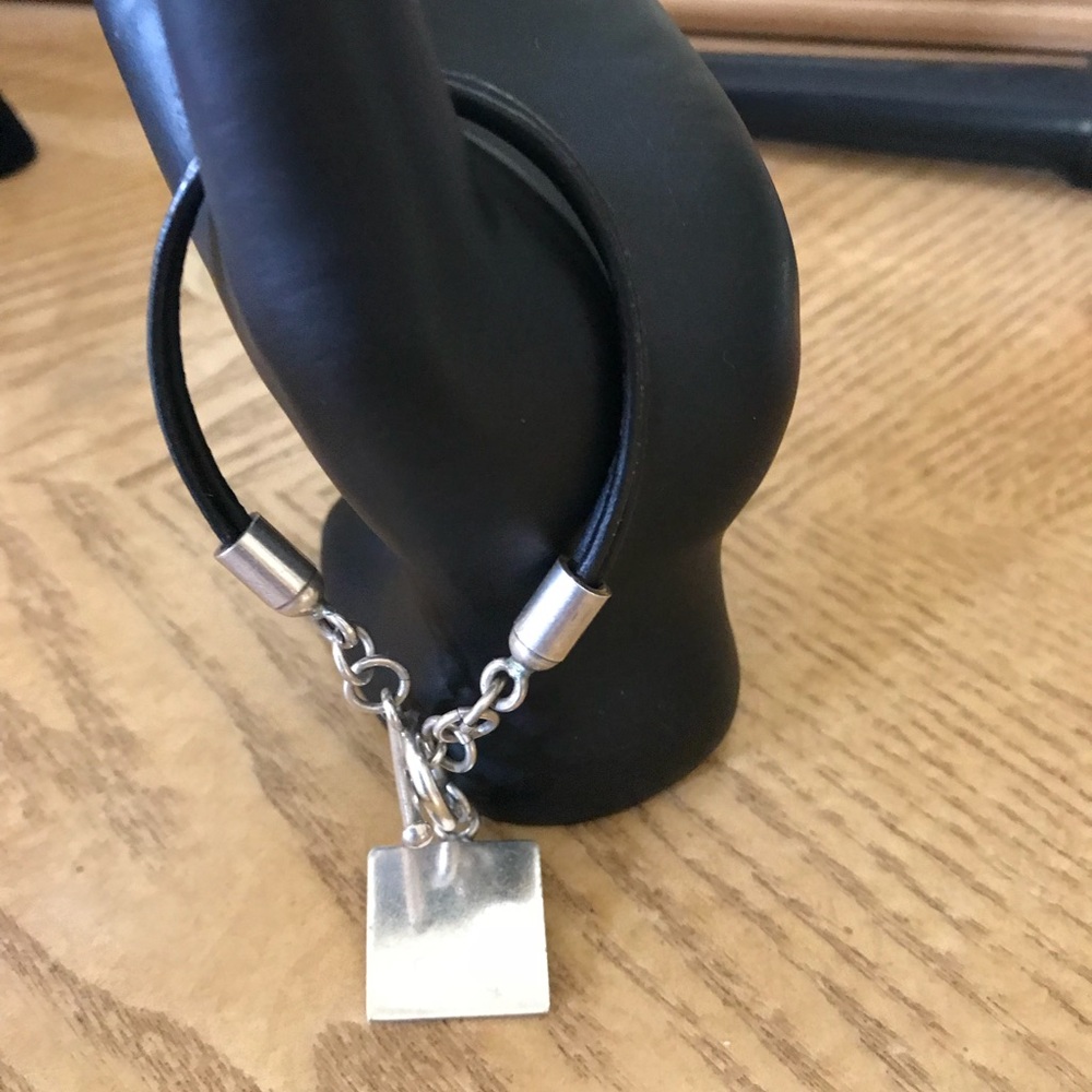 SS silver triple strand leather bracelet w/ charm